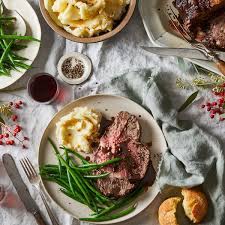 Young stalks of asparagus elegantly accompany prime rib in the spring when served warm in a lemon vinaigrette. The Best Prime Rib Recipe Stars In This Easy Christmas Dinner Menu