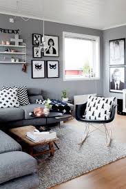 This scandinavian living room livens up its interior with small trees peppering its black, white and wooden space. 25 Best Small Living Room Decor And Design Ideas For 2021