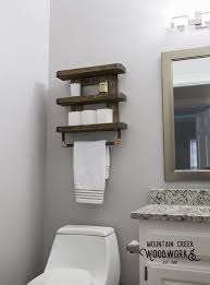 You can color coordinate your towels while stacking them up or can arrange them in different sequences. Wooden Bathroom Shelf Rustic Bathroom Shelf Wooden Towel Rack Bathroom Towel Rack Toilet Sh Wooden Bathroom Wooden Bathroom Shelves Rustic Bathroom Shelves