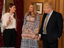 Britain's prime minister boris johnson and carrie johnson pose together in the garden of 10 downing street after their wedding on may 29, 2021. Carrie Symonds Shows Off Her Bump And Engagement Ring Daily Mail Online