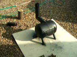 Build A Do It Yourself Tiny Woodstove Posted By Steven On January 2 2012 Diy Wood Stove Wood Burning Stove Gas Bottle Wood Burner