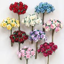 It's made of one large flower and three small cascading flowers in shades of purple, pink and yellow. Paper Flowers Paper Roses Paper Bouquets Gifts Props Decor