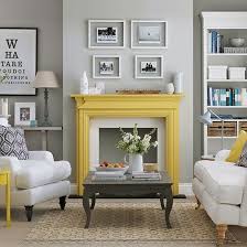 Gray Is The New Tan Gray Paint Or Just The Color Gray In General Has Been All The Rage Living Room Grey Grey And Yellow Living Room Living Room With Fireplace