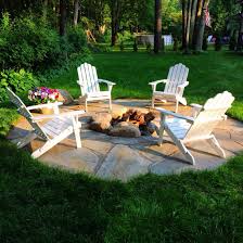My Very Own Pinterestdreamcometrue Flagstone Bolder Firepit With White Adirondack Chairs Out Fire Pit Seating Area Fire Pit Landscaping Fire Pit Backyard