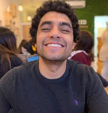 On discrete gradient vector fields and Laplacians of simplicial complexes