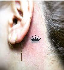 This tattoo of crown is inspired from the ancient roman empire art where the crown was. 25 Beautiful Crown Tattoos Ideas To Show Royalty Blurmark Crown Tattoos For Women Behind Ear Tattoos Crown Tattoo
