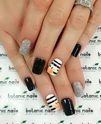 Monochromatic nail patterns are super hot right now, especially in black and white. 40 Halloween Nail Art Ideas Nenuno Creative Pumpkin Nails Nails Halloween Nails