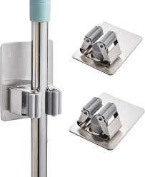 I would like to install it on my side porch to hold a broom. Buy Simple Rural Mop Broom Holder Wall Mount Mop Clips 2 Pack Self Adhesive Mop Grippers Heavy Duty Broom Hanger For Laundry Room Garden Tool Holder Bathroom Accessories Online In Turkey B08mzc24zk