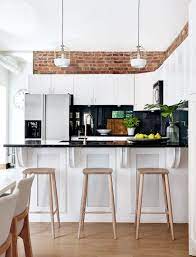 End the cabinets with a shallow utility cabinet: 14 Ideas For Decorating Space Above Kitchen Cabinets How To Design Spot Above Kitchen Cabinets