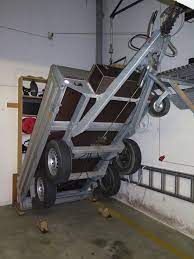 We needed a dry place to store it, asap! Trailer Storage Trailer Storage Utility Trailer Garage Storage