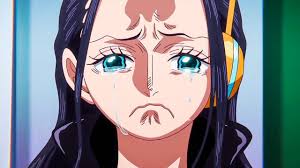 Robin channels the Phantom of the Opera.