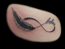 Tatouage Femme Plume Infini Avec Believe Tatouage Femme