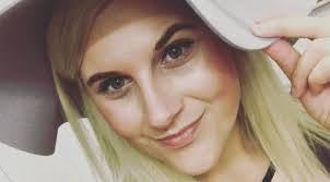 Woman changing flat tyre dies after being hit by minibus