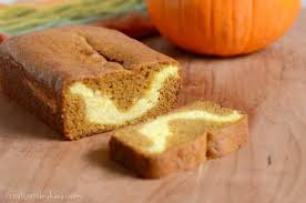 Spread half of the pumpkin bread batter evenly into the two prepared loaf pans. Pumpkin Cream Cheese Bread