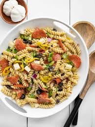 In two large bowls, combine the california vegetables, tomatoes, zucchini, yellow squash, onion, cheeses and pasta. Pizza Pasta Salad Recipe Budget Bytes