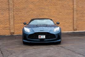 Image result for Concours Blue 2025 Aston Martin