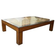 Macys.com has been visited by 1m+ users in the past month Glass Top Wood And Seagrass Coffee Table Ebth