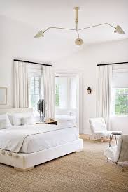 This bedroom collects black and gray in a rug and bedding, while white lines framed bookcases, a paneled feature wall and drop bauble lighting. 830 Black And White Bedroom Ideas White Bedroom Bedroom Inspirations Bedroom
