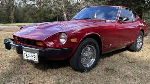 Image result for Maroon 1959 Datsun