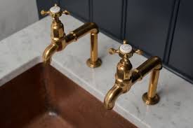 the perfectly aged brass kitchen faucet