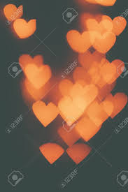 Maybe you would like to learn more about one of these? Many Orange Hearts On A Dark Background Design Wallpaper Stock Photo Picture And Royalty Free Image Image 55892756