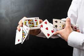 Slide the card behind these fingers to be able to catch it by the sides with your index finger and your little finger hold the card and open your hand with your fingers tights. Magic 101 What Is Sleight Of Hand Learn 10 Different Sleight Of Hand Tricks To Try At Home 2021 Masterclass