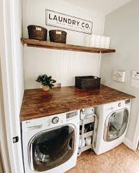 Add A Folding Table Counter On Top Of Washer And Dryer With A Great Piece Of Wood Stained Sealed And Affixed To The In 2020 Laundry Room Decor Laundry Room New Homes