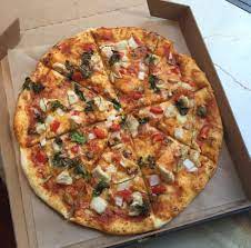 introducing our new signature vovito pizzas tandoori chicken or butter chicken for just 8 savor a 10 inch thin crust vovito pizza covered with spicy tandoo