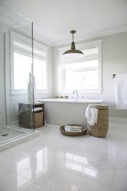 It provides the foundation and tone for the room. Bathroom With Large White Tiles Novocom Top
