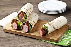 Spread in a single layer on baking sheet. Smoked Sausage Wraps Recipe Sausage Wrap Sausage Smoked Sausage