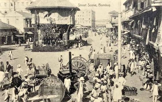 Street Scenes In British Era Bombay – 4 Postcards 1900s Five postcards that date from the 1900s show street scenes in British Era Bombay (Mumbai). The first postcard is of Medows Street