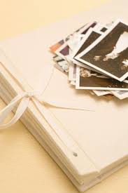 This is a guide about decorating a photo album. How To Create A Heritage Scrapbook Family History Album