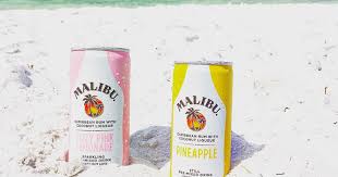 For the malibu drink, pour the pineapple juice, the grenadine, the pineapple rum and the cherry juice into a glass. Malibu Rum Canned Drinks Popsugar Food