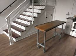 a kitchen island with fittings & pipe