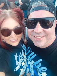 What is the meaning of the TMobile ad with 2 guys in a garage?