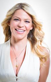 ABOUT — Amber Lyon