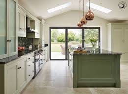 Soft Green Kitchen Mizzle On The Main Cabinetry And Green Smoke On Th Cottage Kitchen Inspiration Open Plan Kitchen Living Room Black Kitchen Countertops