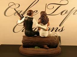 Years ago, it was assumed that a married woman would have a baby within a year after her some accounts deflect to a baker centuries ago who made a cake topper for his daughters wedding to signify the unity and love between the two of. Parity Hunting Wedding Cake Toppers Up To 61 Off