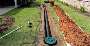 For a dry well, you need to dig a hole about 10 ft (120 in) from the nearest drain or downspout in the wet portion of your yard. Gutter Solutions And Waterproofing Backyard Drainage Landscape Drainage Yard Drainage