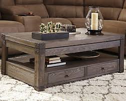 Made of decorative laminate, engineered wood and metal. Burladen Coffee Table With Lift Top Ashley Furniture Homestore