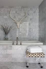Carrara Marble Bathroom With Lucite Stool Upholstered In Kelly Wearstler S Imperial Trellis In Cha Marble Bathroom Designs Marble Bathroom Marble Tile Bathroom