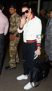 Kareena Kapoor Travel Look Comprised Of Gucci Jacket And Black Ripped Denims Gucci Jacket Bollywood Fashion Ripped Denim