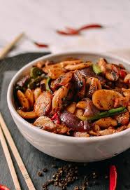 Spicy Stir Fried Rice Cakes With Sichuan Peppercorns The Woks Of Life Recipe Fried Rice Rice Cakes Pork Belly