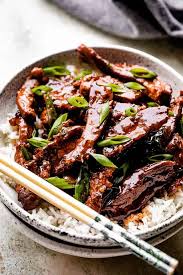 This Copycat P F Chang S Mongolian Beef Recipe Is Made With Flank Steak That Is Simmered In Mexican Food Recipes Authentic Beef Recipes Mongolian Beef Recipes