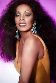 Queen for a Day: A Disco Dream Donna Summer's "Queen for a Day" is a  shimmering jewel from the disco era, a time of exuberant celebration and  escapism. With its infectious beat