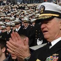 Cmdr. Russell Caldwell arrives to a change of command ceremony aboard USS  Ross (DDG 71) during a scheduled port visit to Larnaca, Cyprus, April 11,  2017.