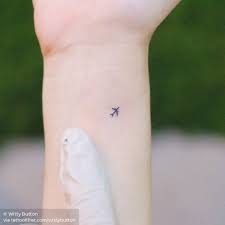 Tiny Airplane Tattoo On The Wrist Airplane Tattoos Discreet Tattoos Small Tattoos