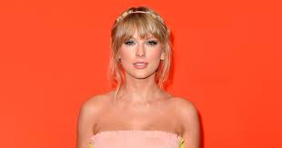 — taylor swift (@taylorswift13) november 22, 2020. Taylor Swift Wears Braided Buns In New Folklore Album