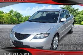 Image result for Sunlight Silver 2007 Mazda3