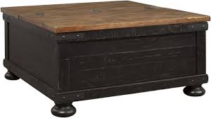 The stability of the farmhouse end table is better, and the vintage feature is more intense. Valebeck Black And Brown Square Lift Top Cocktail Table From Ashley Coleman Furniture